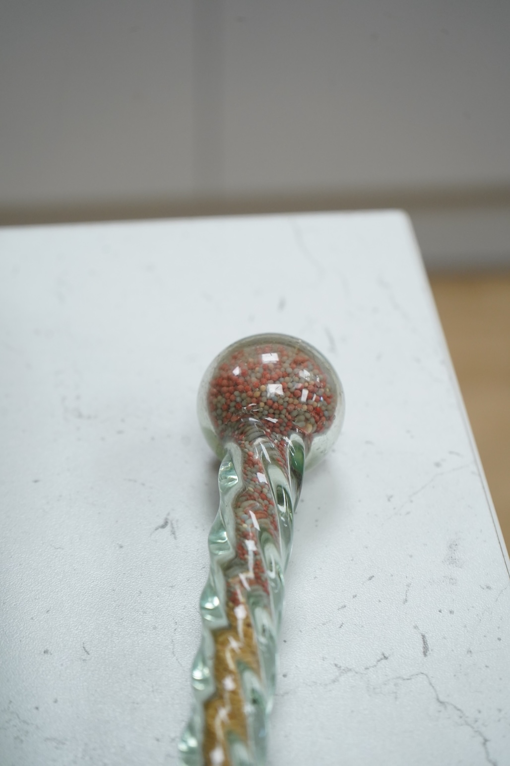 A 19th century Nailsea spiral walking stick, decorated with fine coloured beads, 128cm in length